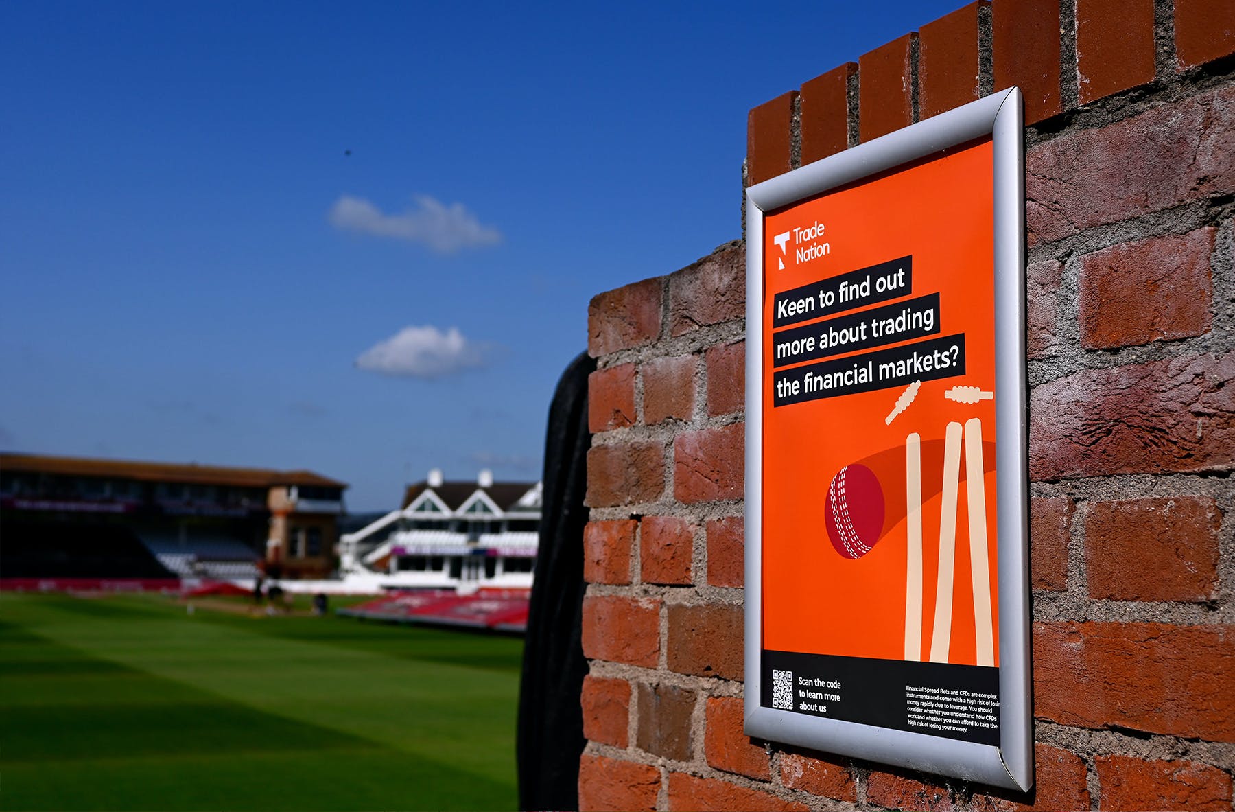 Trade Nation poster with the Somerset County Cricket Club ground in the background